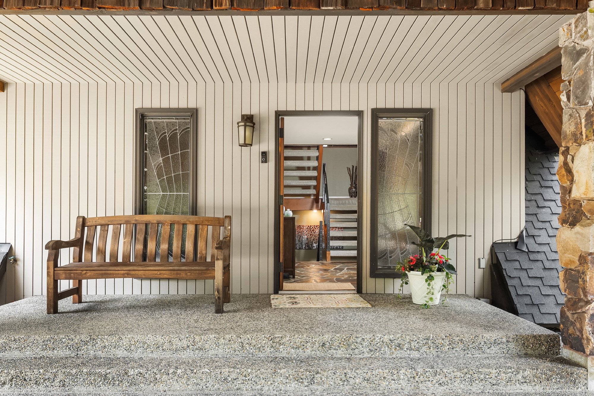 Covered front entry with bench